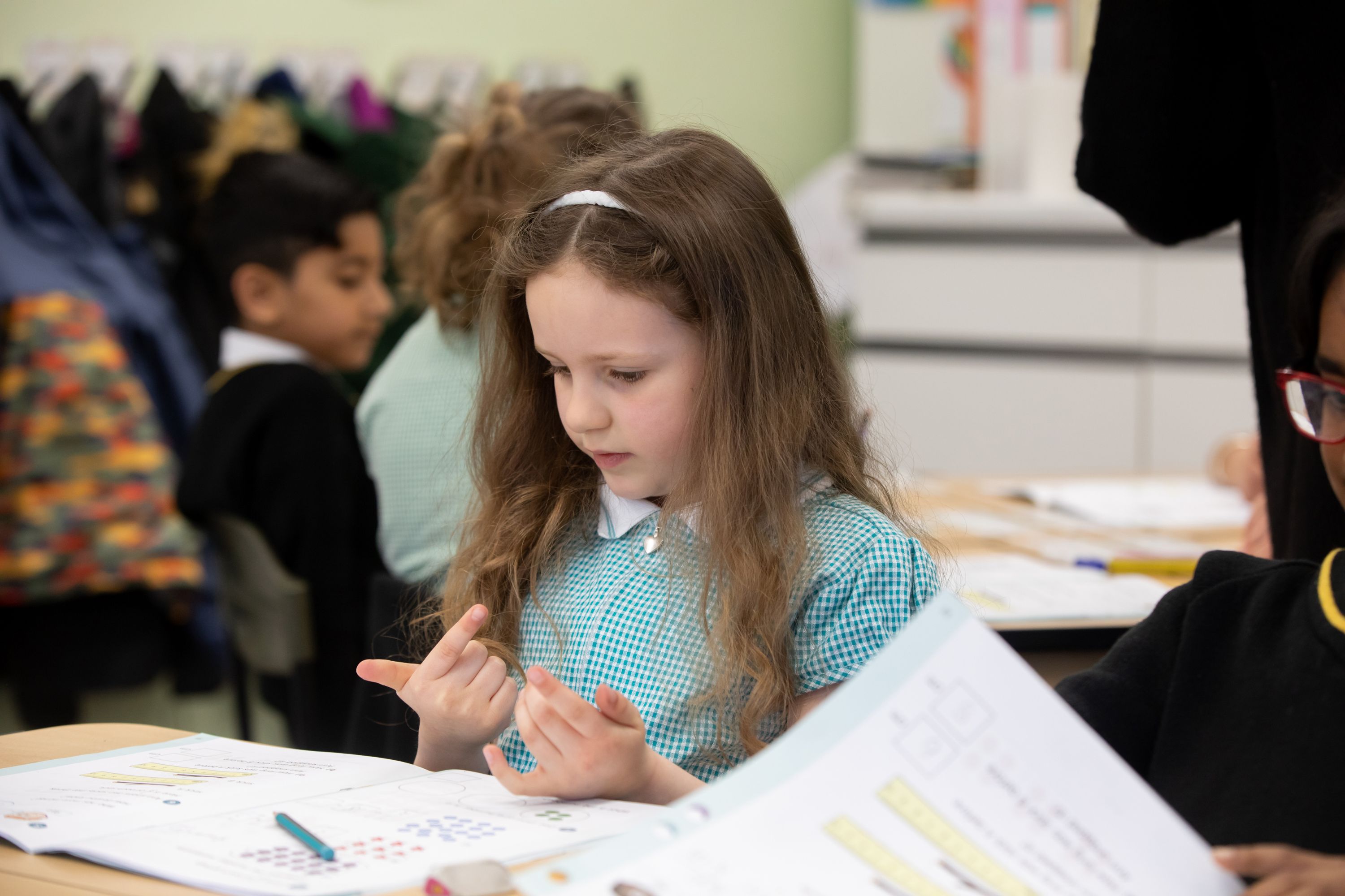 Young girl doing maths