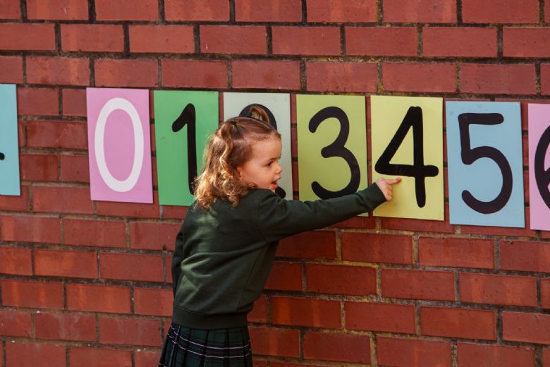 Young girl counting