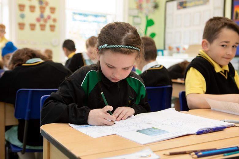 Young pupils working